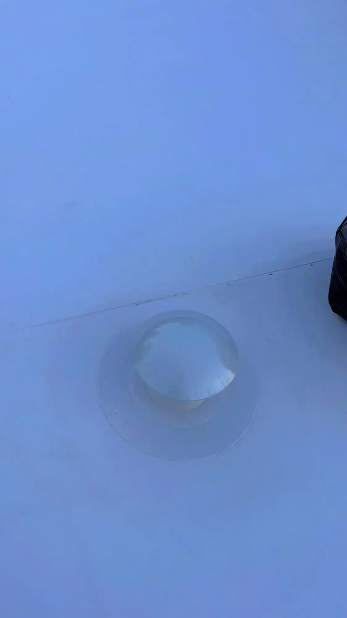 Membrane roof vent inspected during a flat roof repair in Auckland