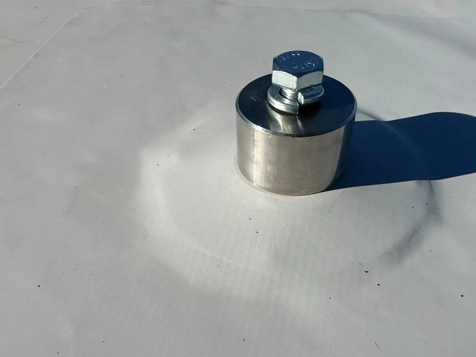 Stainless steel penetration collar welded into a membrane roof