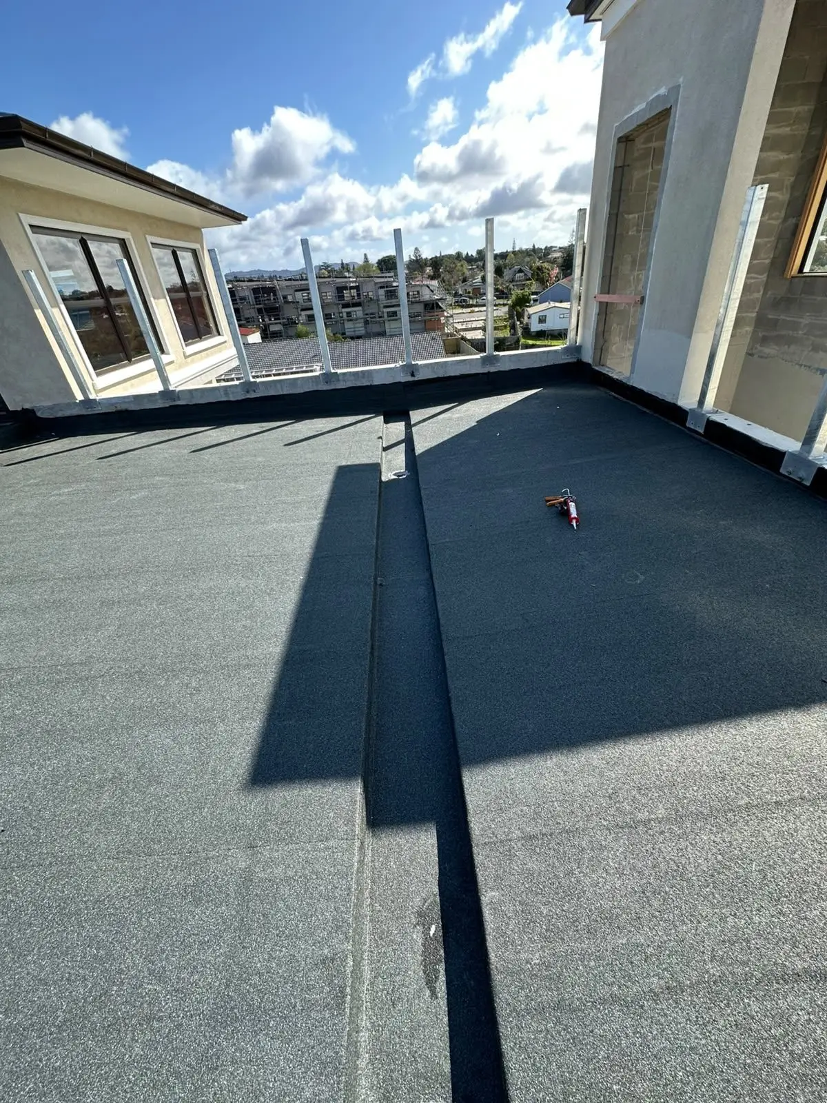 Torch-on membrane deck with an Auckland city outlook