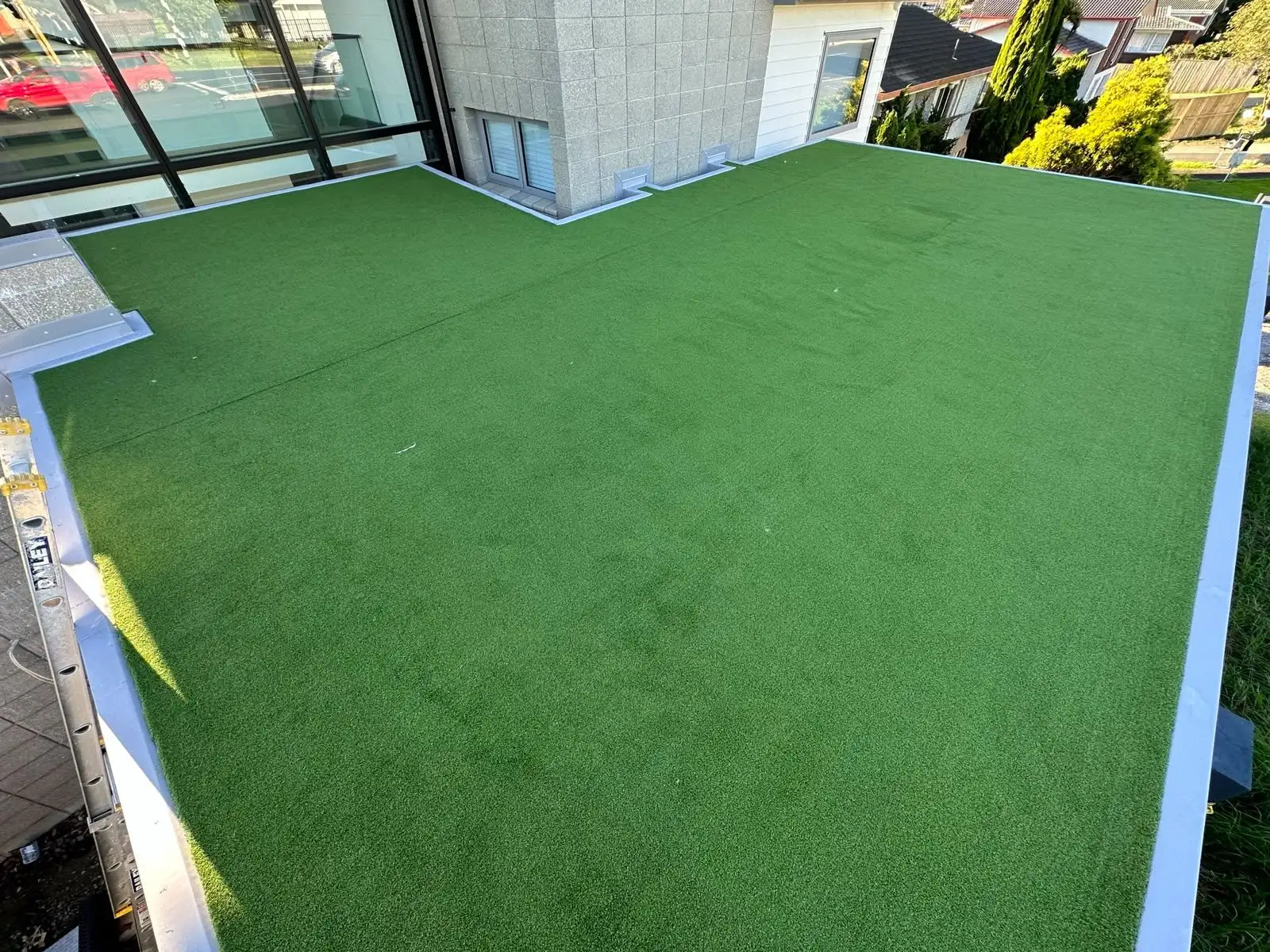 Turf-covered membrane roof deck completed on an Auckland property